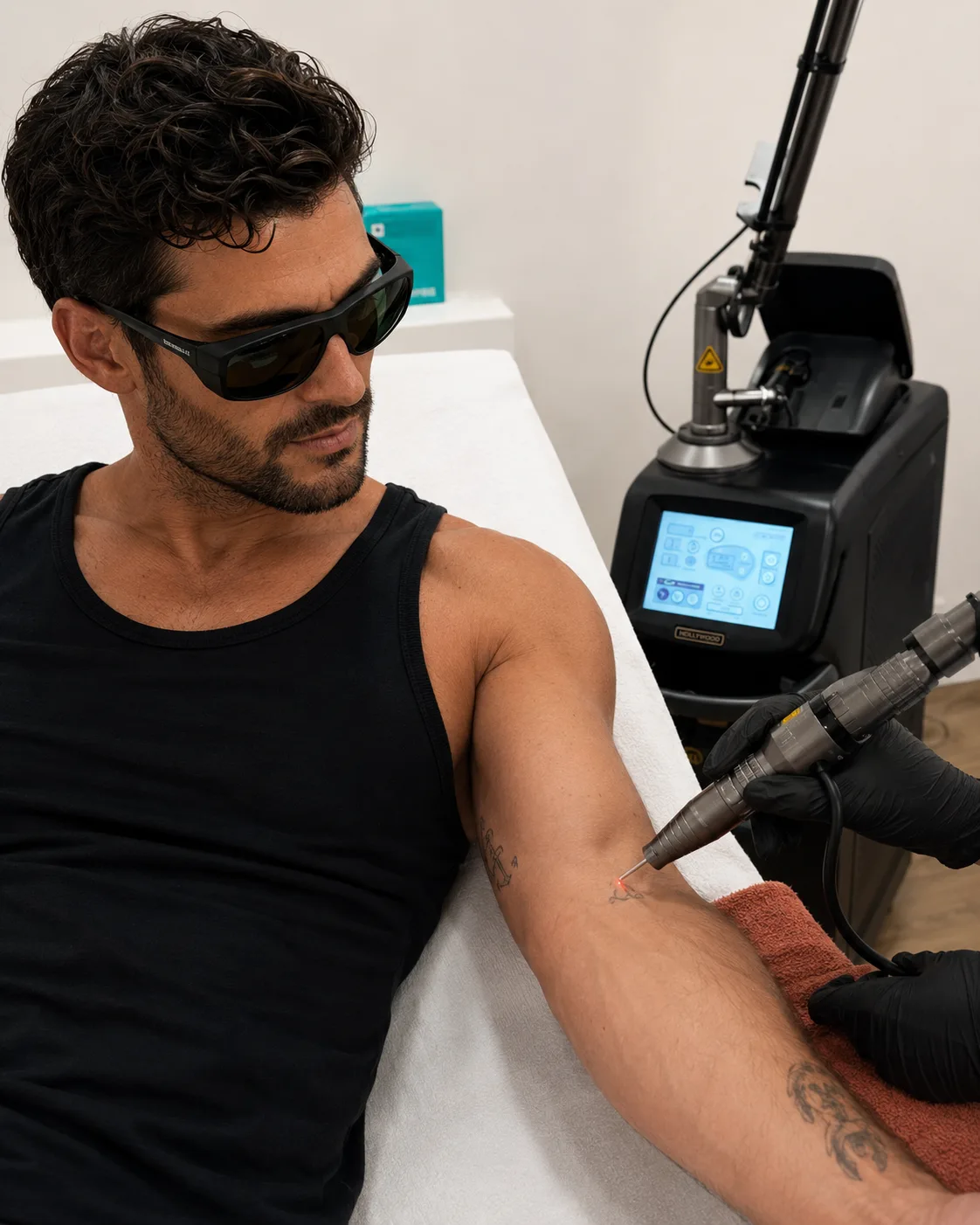 Évaluation d'un tatouage avant détatouage laser à la consultation